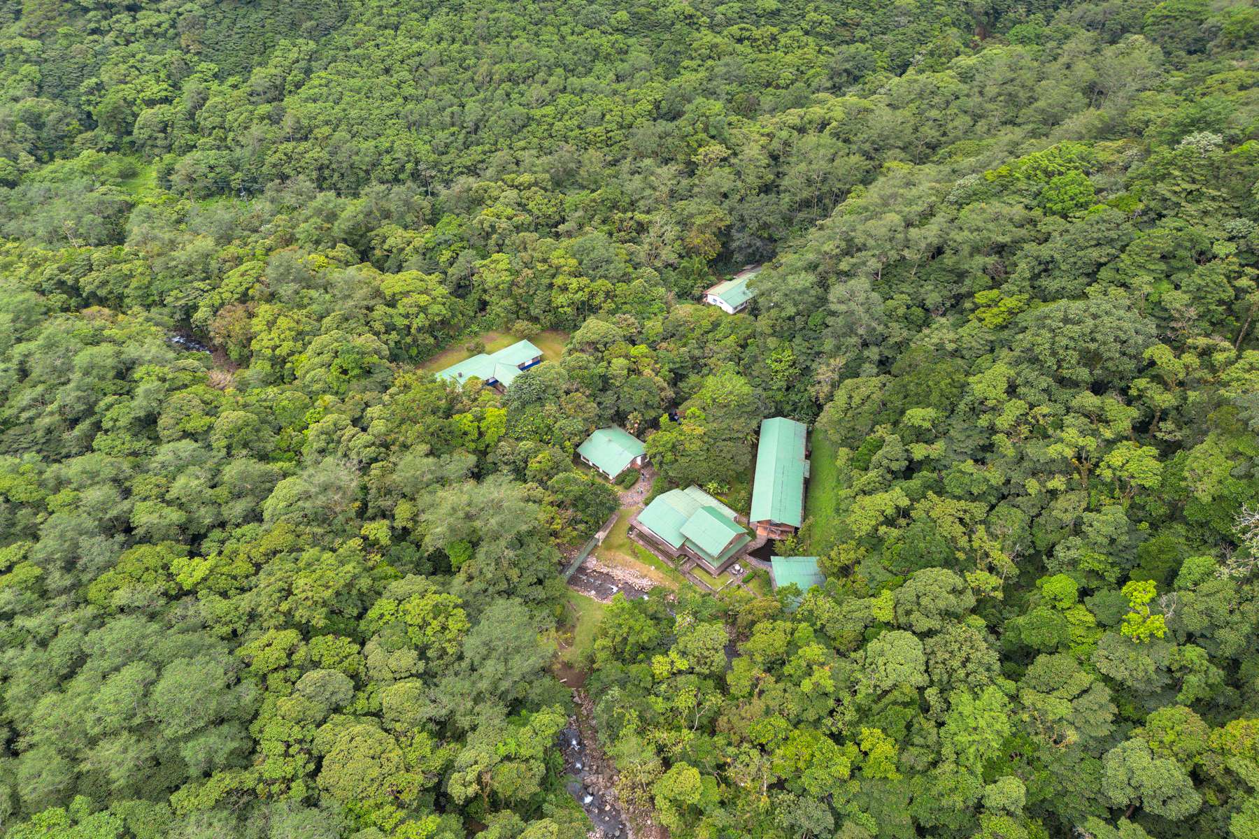 1000ac conservation cloud forest with waterfalls, ecolodge, owner residence